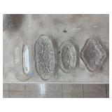 4 ornate glass dishes