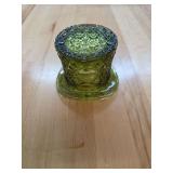 Green glass hat decor.