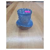 Blue glass hat decor.