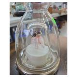 Dancing couple in a bottle.