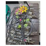 lot contains a stack white yard fencing approximately 8 inches height and yard art