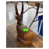 Wooden impala statue.
