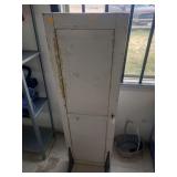 lot contains a repurposed vintage-style wooden door that has been set up to use as a chalk board stand