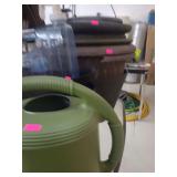 lot contains a watering jug, plastic water container, trash can,7 flower pots.