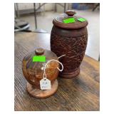 Two wooden vases with lids
