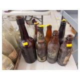 Mixed amber colored glass bottles