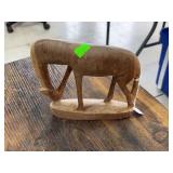 Wooden giraffe statue.