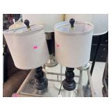 Small black table lamps with white shades