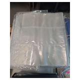 Binder with empty card sleeves and a box of card sleeve pages