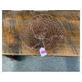 Copper colored metal hanging fruit basket