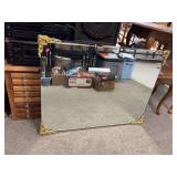 Large mirror with gold decorative corners