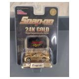 NIB Snap-on tools 1998 limited edition. die cast car body is 24k gold plated.