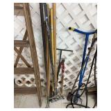 3 small garden rakes, pruner, tamping bar and a paint roll on a 5’ handle