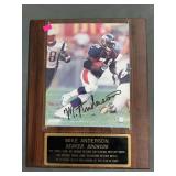 Mike Anderson image and info plate, on wood