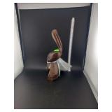 lot contains a hand carved wooden pelican made from ironwood.