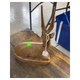 Wooden impala statue.