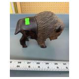 Wooden buffalo carving