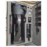 Celestron telescope.