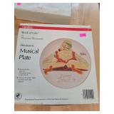 Musical plate and picture holder.