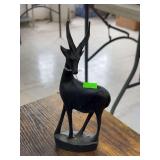 Wooden impala statue.