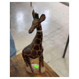 Wood Giraffe statue.