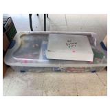 Tote of gifts wrap and birthday decorations