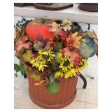 Pot of faux fall flower arrangement