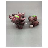 Wale and elephants made with red resin.