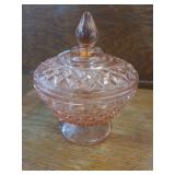 lot contains a vintage pink depression glass candy dish with a lid, featuring a decorative diamond-cut pattern. Based on its design, this piece is widely recognized as the Anchor Hocking Wexford patte