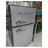 lot contains a Frigidaire  3.1 cu ft mini fridge and freezer.