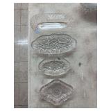 4 ornate glass dishes