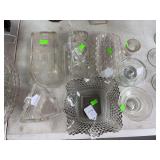 Glass trays, candles holders and 3 butter dishes.