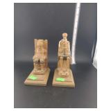 lot contains vintage hand-carved wooden bookends depicting the iconic literary characters Don Quixote and Sancho Panza.