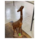 Wood giraffe statue