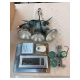 3 yard spot lights, a wireless weather thermometer and an oxygen tank regulator
