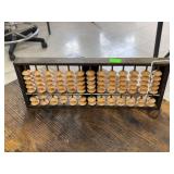 Antique wooden counting tool.