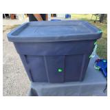Tote with women's clothing