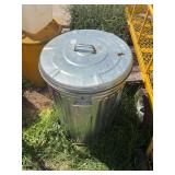 Metal trash can with bird seed