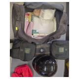 Mad dog dog bags And first aid kit and a helmet.