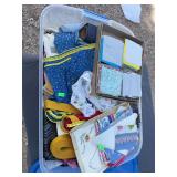 Tub with quilting, fabric, and miscellaneous samples of fabric has lid