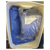 Storage bin with 3 10 by 20 foot tarps inside