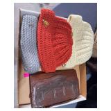 Stocking caps and leather purse
