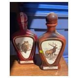 Flat with  Vintage Jim Beam Wildlife Decanters with Assorted Ping Pong Balls tins