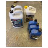 2-1 gallons of 50/50 super tech coolant, 3 bottles SAE HD-30 motor oil,