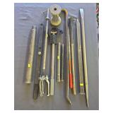 Misc metal bars and clamping tools with crowbars.