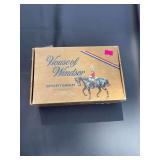 Vintage cigar box with sewing kit
