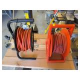 2 extension cord reels with the cords