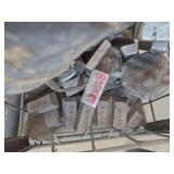 Bin of lead scraps.