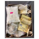 Box full of cleaning pads, patches, and cleaning swabs