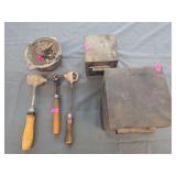 Metal melting and casting tools.